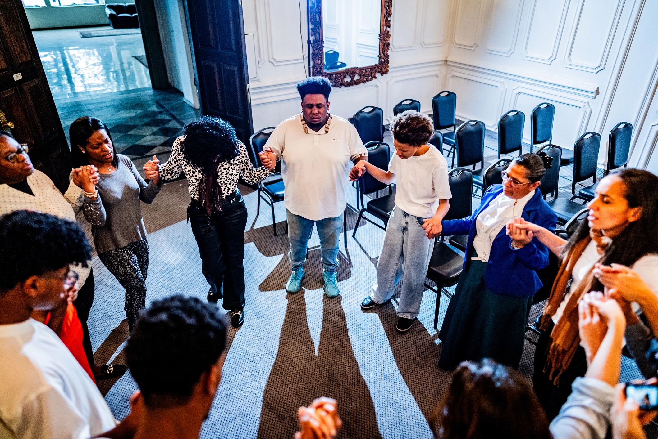 Church community gathered in prayer